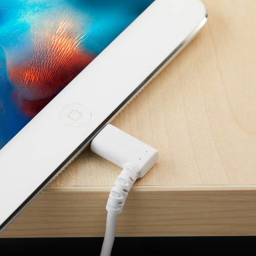 White USB to angled cable connected to a white iPad